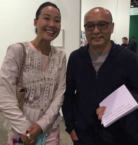 Ms. Susanna Yang with renowned Chinese contemporary artist Zhang Xiaogang