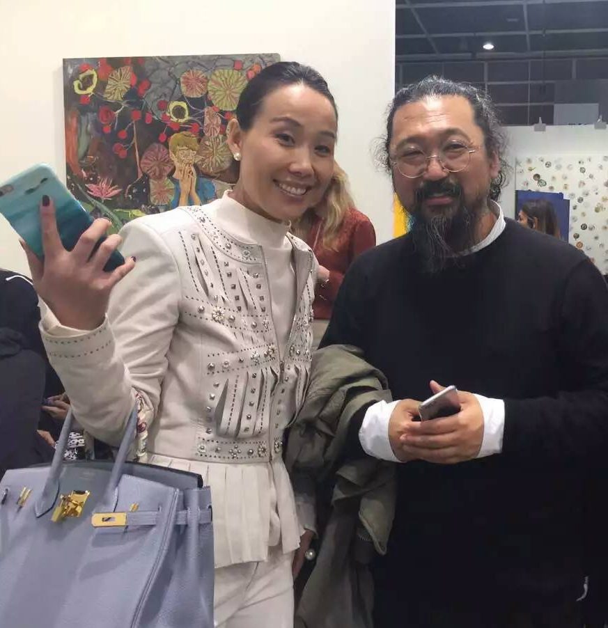 YANG GALLERY Singapore & Beijing 798 Managing Director Ms. Susanna Yang with established artist Takashi Murakami.