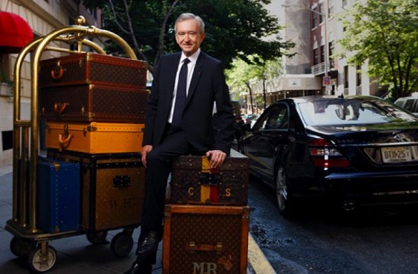 LVMH CEO, Bernard Arnault visits the garden with General auctioneer of the  exposure, Jean-Luc Dufresne at the the Christian Dior's house and museum in  Granville, Britain coast of France on May 14